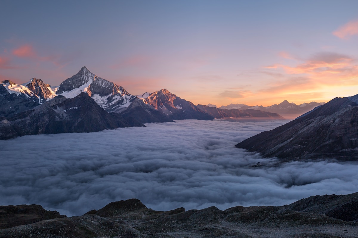Mountain peaks piercing through a sea of clouds viewed from Kilimanjaro's northern slopes