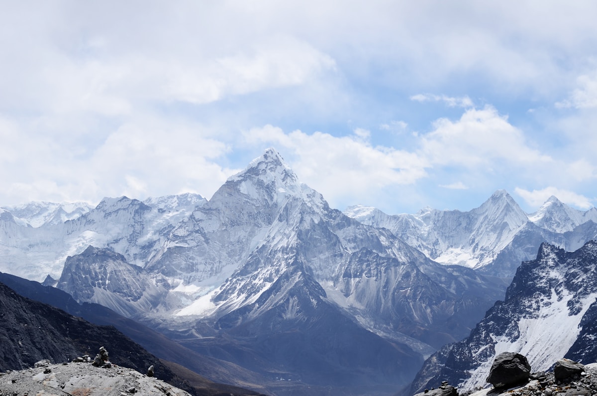 Dramatic mountain landscape with layered peaks fading into the distance
